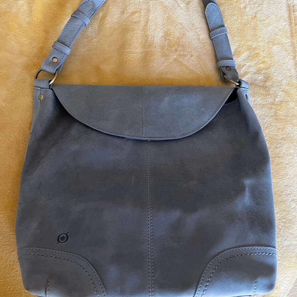 Born 100% REAL leather purse. New w/o tags